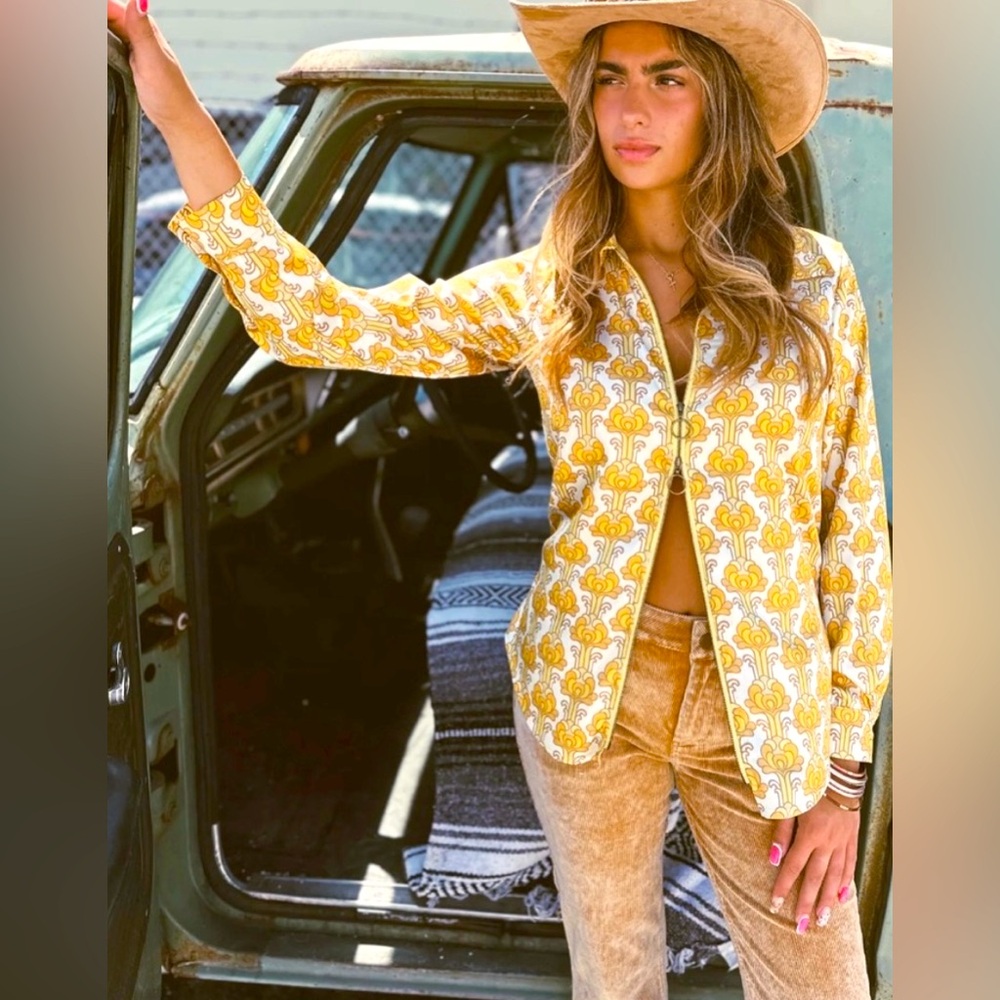 Yellow Patterned Dual ring zip up shirt.